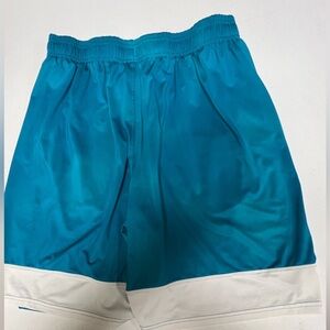 UNDER ARMOUR MEN’S SIZE LARGE LOOSE SHORTS  DARK TURQUOISE W/WHITE TRIM